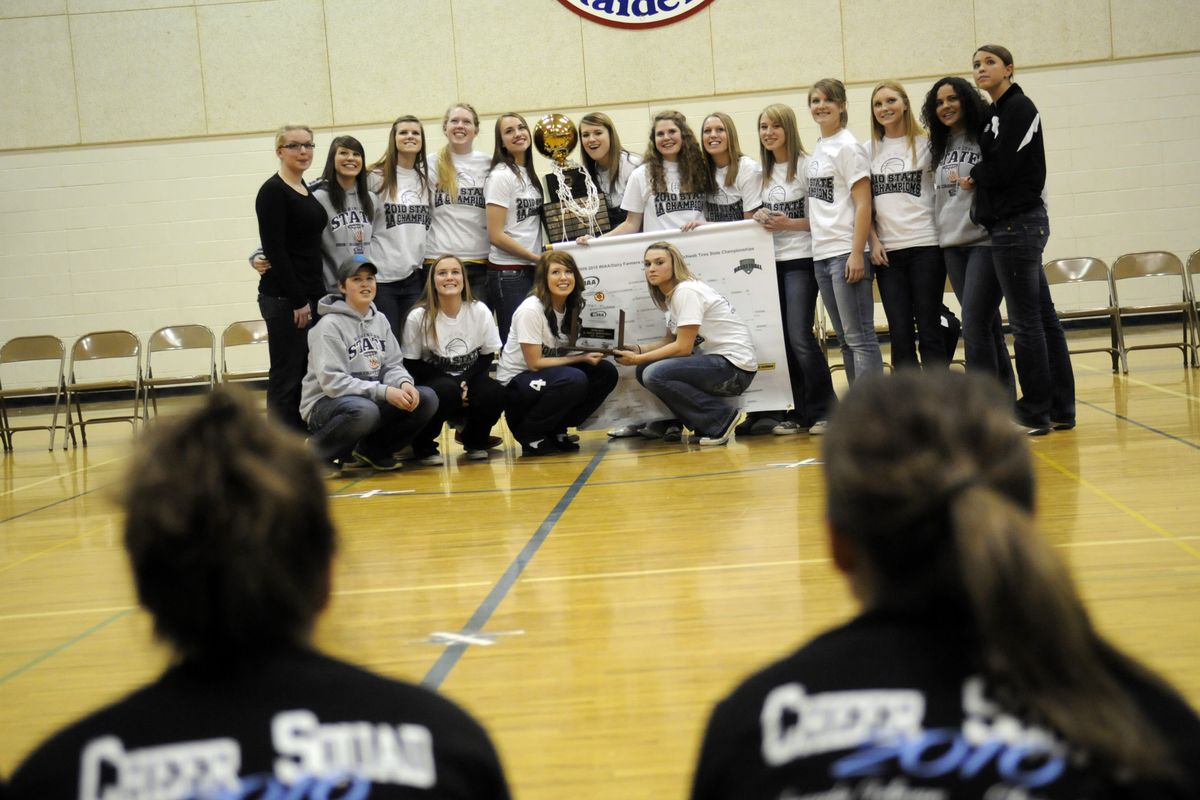 The 2010 State 1A  girls basketball tournament champions, Freeman,   gather for pictures during  school assembly Tuesday.bartr@spokesman.com (J. BART RAYNIAK)