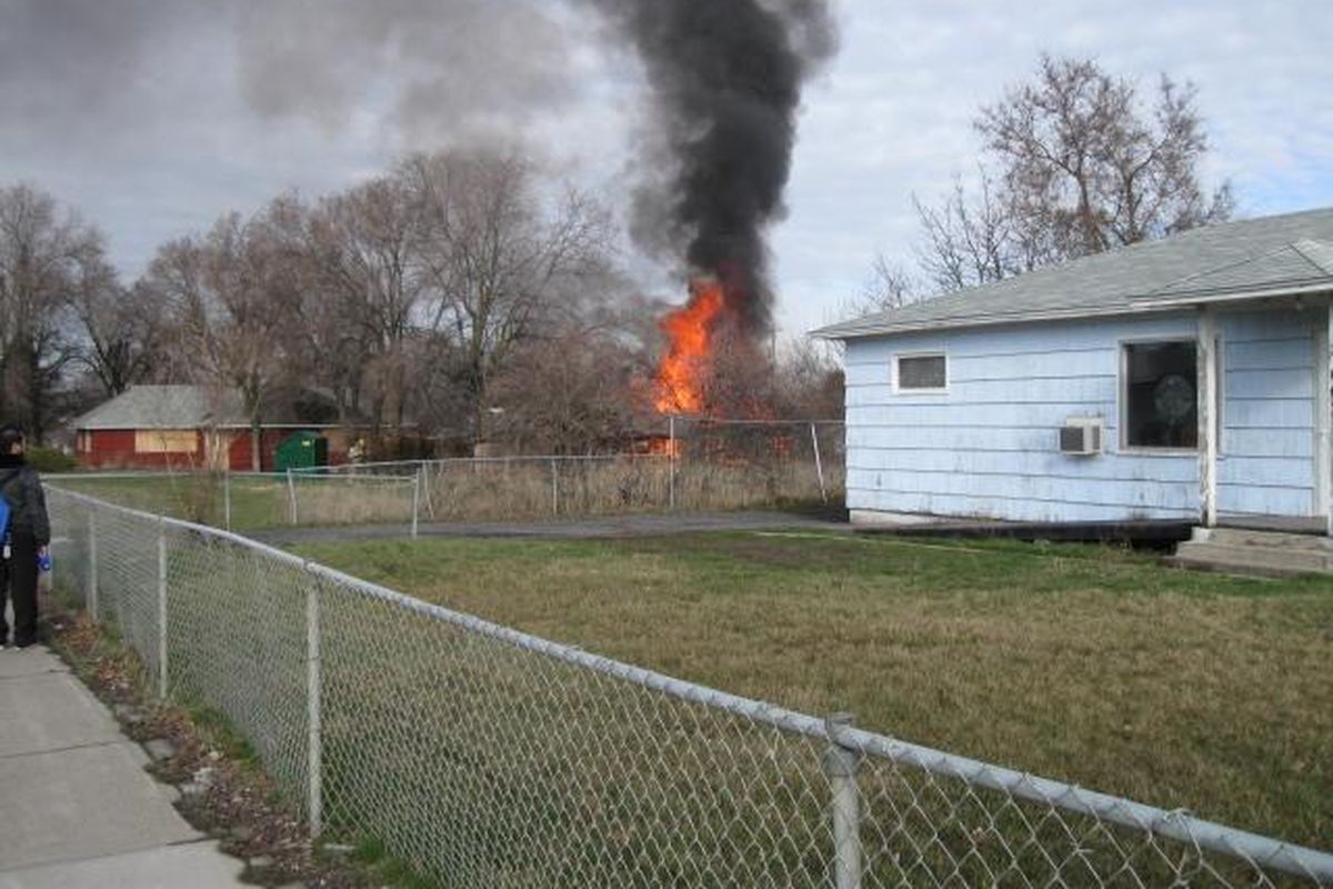 A shed next to a vacant home burned at Park Road and Broadway Ave. the morning of March 27, 2012. (Photo courtesy the Spokane Valley Fire Department)