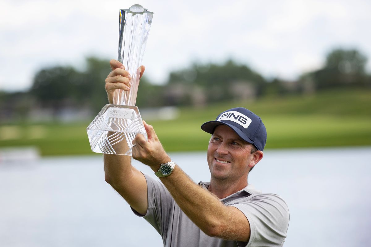 Michael Thompson holds the trophy after winning the 3M Open golf tournament in Blaine, Minn., Sunday, July 26, 2020.  (Andy Clayton-King)