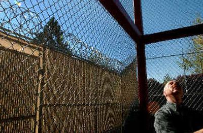 
Kootenai County sheriff's Capt. Ben Wolfinger discusses an inmate's escape from the outdoor recreation area during a tour of the jail on Monday. 
 (Kathy Plonka / The Spokesman-Review)