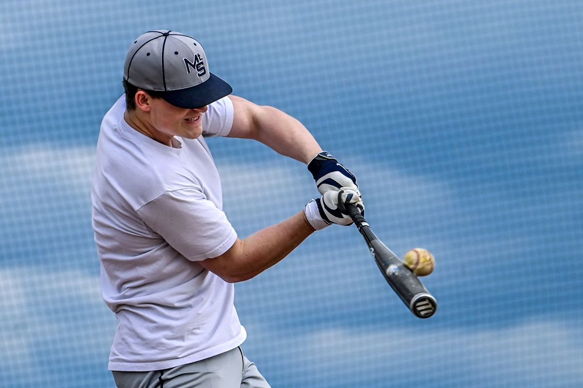 Mt. Spokane senior Carson Coffield works on his swing Wednesday ahead of Friday’s State 3A semifinal against Kennewick in Pasco.  (COLIN MULVANY/THE SPOKESMAN-REVIEW)