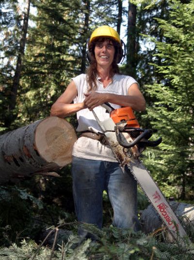 
Sandy Schelpp finished de-limbing and bucking an 80 foot fir tree in just minutes  at Rose Lake. Her speed and agility is to be admired. 