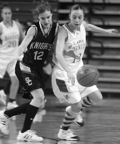 
Inchelium's Chelsi Pakootas, right, defends Sunnyside Christian's Tori Van Wingerden. 
 (Gordon King Special to / The Spokesman-Review)