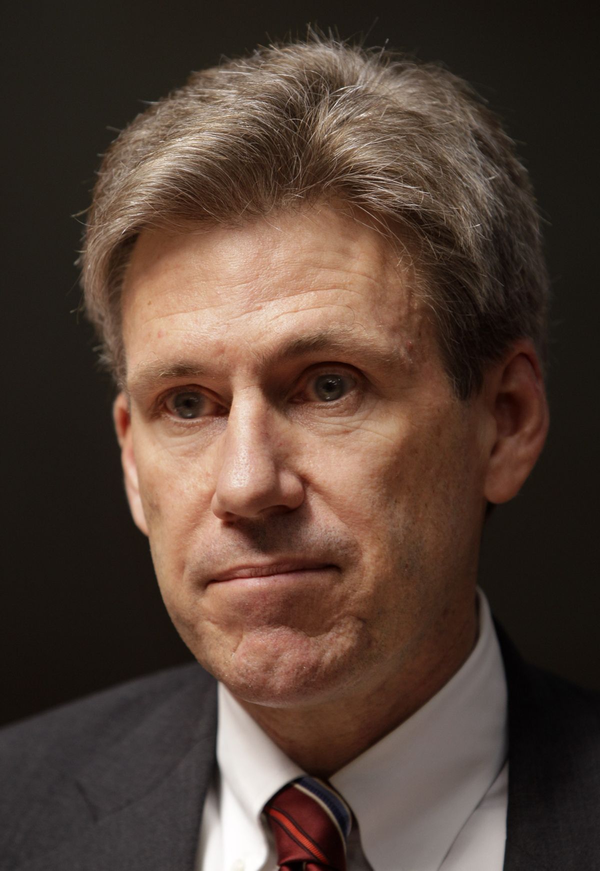 FILE - In this Monday, April 11, 2011 file photo, U.S. envoy Chris Stevens stands in the lobby of the Tibesty Hotel where an African Union delegation was meeting with opposition leaders in Benghazi, Libya. Libyan officials say the U.S. ambassador and three other Americans have been killed in an attack on the U.S. consulate in the eastern city of Benghazi by protesters angry over a film that ridiculed Islam's Prophet Muhammad. The officials say Ambassador Chris Stevens was killed Tuesday night when he and a group of embassy employees went to the consulate to try to evacuate staff. The protesters were firing gunshots and rocket propelled grenades. (Ben Curtis / Associated Press)