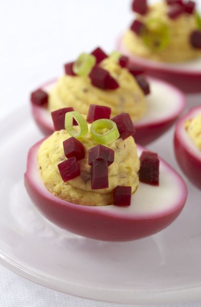 Beet’ing Heart Deviled Eggs, from “D’Lish Deviled Eggs,” are colored with pickled beet juice.