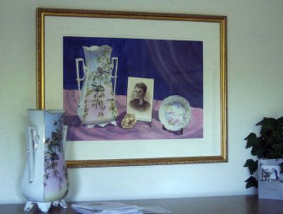 
This watercolor in Anne Sherrodd's living room features a china vase and plate that her great-grandmother, Marion Kimmel Neill, painted in 1885. Sherrodd also included her grandmother in the painting. She owns the china vase which is displayed next to the painting. 
 (The Spokesman-Review)
