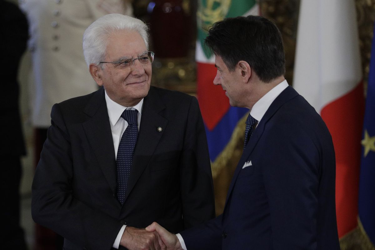 In this Sept. 5, 2019 photo, Italian President Sergio Mattarella, left, shakes hands with Prime Minister Giuseppe Conte during the swearing-in ceremony at the Quirinale Presidential Palace, in Rome. Italian Premier Conte was meeting Tuesday, Jan. 26. 2021 with his cabinet before heading to the presidential palace to offer his resignation after a key coalition ally pulled his party’s support over Conte’s handling of the coronavirus pandemic. (Andrew Medichini)