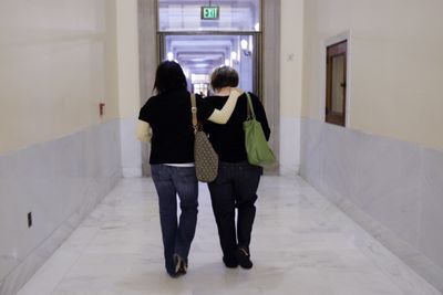 Kristina Haas, right, and Jennifer Briz leave a clerk’s office after they were denied marriage  at San Francisco City Hall  on Wednesday.  (Associated Press / The Spokesman-Review)