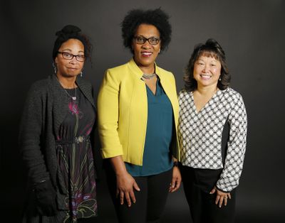 From left, Tanisha Agee-Bell, Mina Jefferson and Susan Stockman pose Thursday, Feb. 8, 2018, in the Enquirer Studio in downtown Cincinnati. The three women are mother's to sons who have recently been the victims of racist behavior. (Sam Greene / AP)