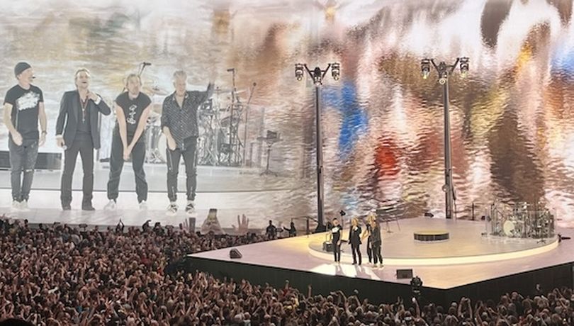 Set against The Sphere's digital backdrop, the Irish band U2 thanks some 18,000-plus fans. (Mary Pat Treuthart)