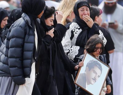 Mourners arrive for a burial service of a victim from the March 15 mosque shootings at the Memorial Park Cemetery in Christchurch, New Zealand, on Thursday, March 21, 2019. (Vincent Thian / AP)