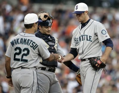 M’s manager Don Wakamatsu pulls starting pitcher Doug Fister in the fifth inning.  (Associated Press)