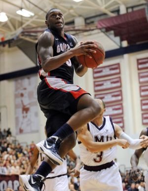 Gonzaga guard Gary Bell Jr. drives past Loyola Marymount’s Anthony Ireland during the second half. (Associated Press)