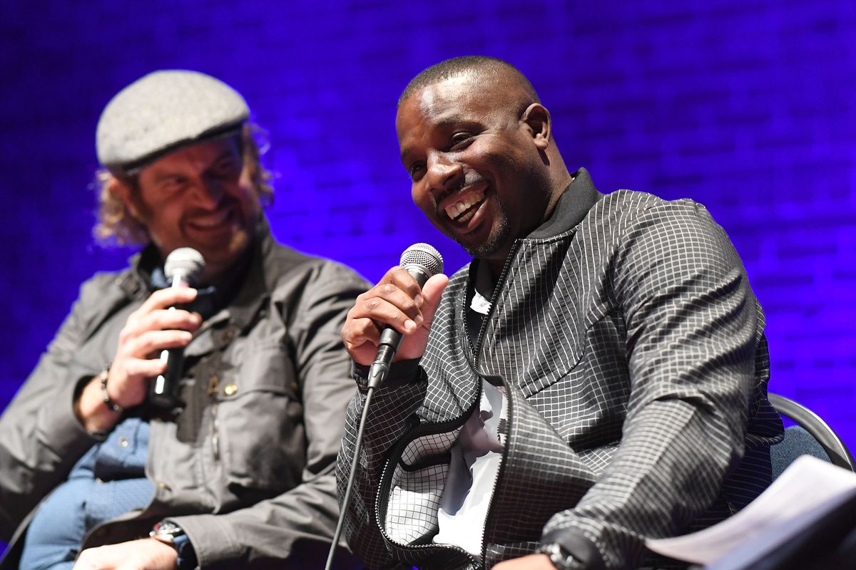 Actor and Gonzaga alumnus Eric Edelstein laughs with former Gonzaga basketball player Quentin Hall during the Northwest Passages World Court event at the Bing Crosby Theater on  (Colin Mulvany/The Spokesman-Review)