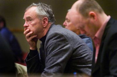 
 Developer Mick McDowell listens to testimony Thursday at Spokane City Hall regarding his proposed high-rise condo project above Peaceful Valley. 
 (Christopher Anderson / The Spokesman-Review)