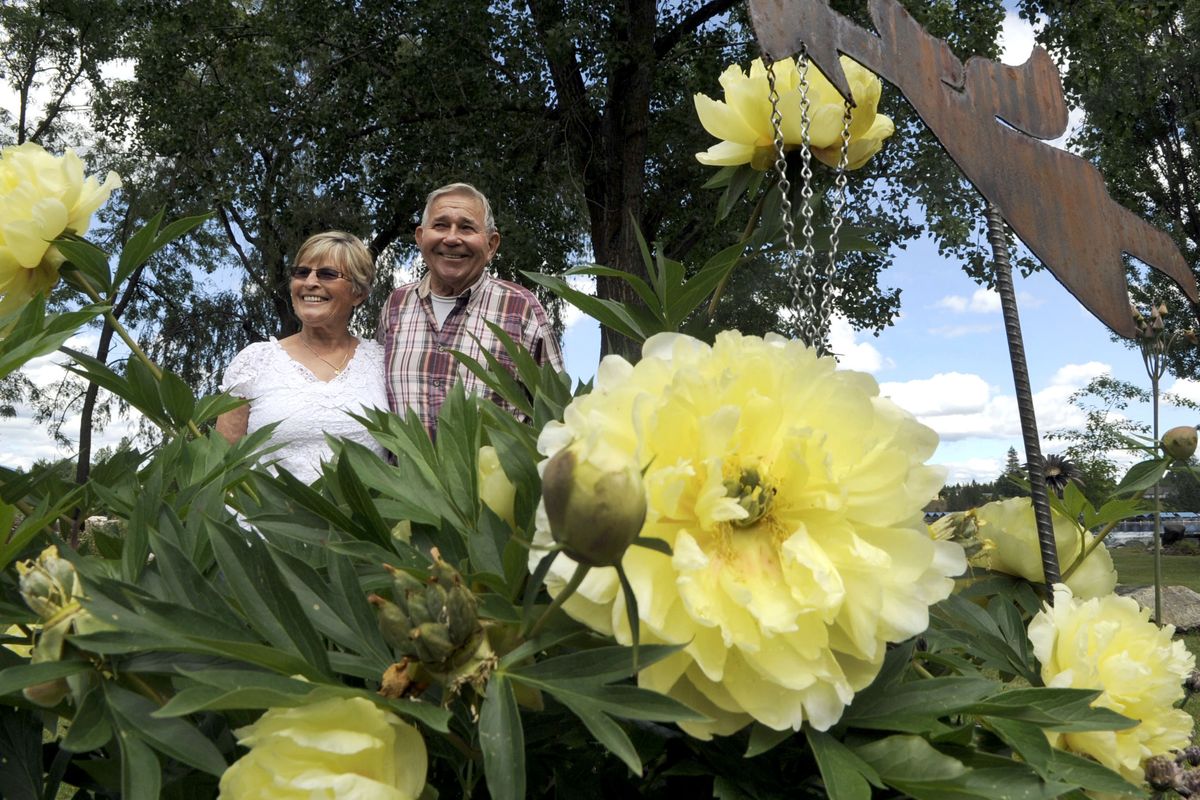 Diane and Bob Hoffman will show off the immaculate garden of their Post Falls home during next weekend’s Coeur d’Alene Garden Tour. The couple has spent the past 11 years perfecting the space. (Kathy Plonka)