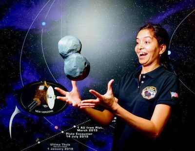 Rajani Dhingra, a graduate student with the University of Idaho Physics Department, “holds” a 3D image of Ultima Thule, the Kuiper Belt object scanned by the New Horizons spacecraft on New Year’s Day. (Moscow-Pullman Daily News)