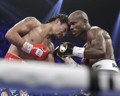 Timothy Bradley, right, won a split decision from Manny Pacquiao. (Associated Press)