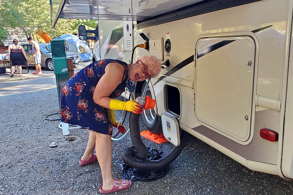 Leslie Kelly takes her turn dumping the sewer during a visit to Leavenworth. (Chris Kelly)