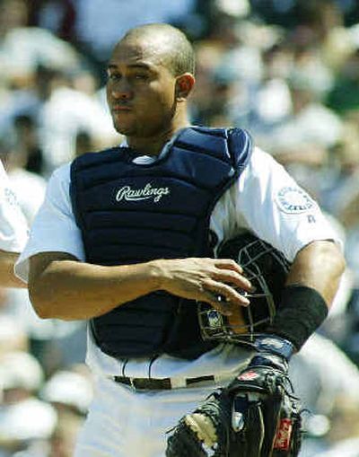 
Mariners catcher Miguel Olivo needs a little more time to get used to his pitchers and regain his confidence.
 (Associated Press / The Spokesman-Review)