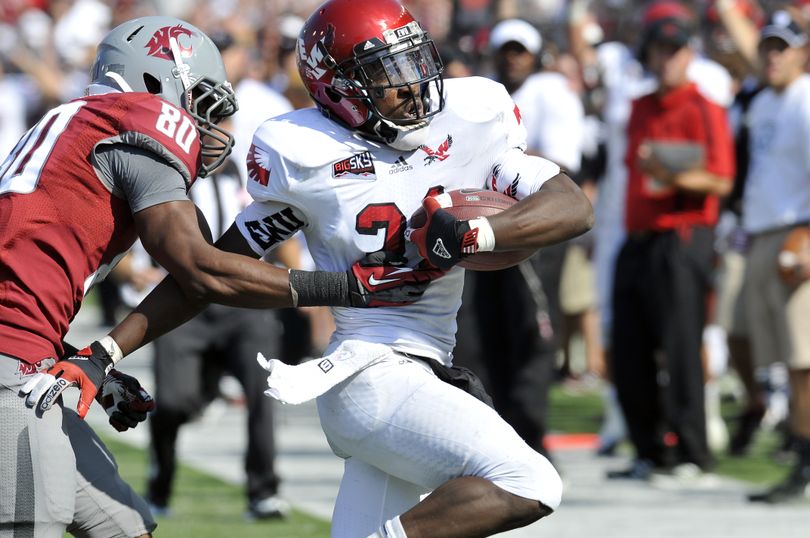 Eastern Washington's T.J. Lee, right, intercepts a ball intended for Washington State's Dominique Williams (80) in the fourth quarter Saturday, Sept. 8, 2012 at Martin Stadium at WSU.  The Cougars won 24-20. (Jesse Tinsley / The Spokesman-Review)