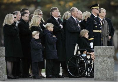 
Betty Ford, seated in a wheelchair, is surrounded by members of former President Gerald R. Ford's immediate family  at his interment site at the Gerald R. Ford Presidential Museum on Wednesday in Grand Rapids, Mich. 
 (Associated Press / The Spokesman-Review)
