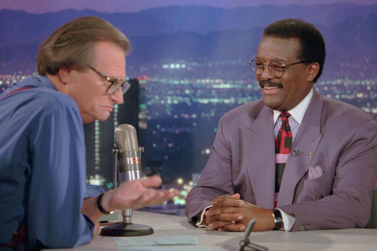 In this Oct. 4, 1995 photo, Defense attorney Johnnie Cochran Jr., right, sits for an interview with Larry King, the host of the "Larry King Live" show in the Hollywood section of Los Angeles. King, who interviewed presidents, movie stars and ordinary Joes during a half-century in broadcasting, has died at age 87. Ora Media, the studio and network he co-founded, tweeted that King died Saturday, Jan. 23, 2021 morning at Cedars-Sinai Medical Center in Los Angeles.  (DAMIAN DOVARGANES/Associated Press)