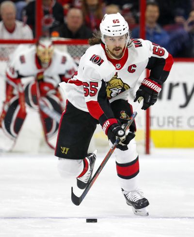 In this Jan. 30, 2018, file photo, Erik Karlsson (65) moves the puck against the Carolina Hurricanes during the first period of an NHL hockey game, in Raleigh, N.C. The San Jose Sharks have acquired the two-time Norris Trophy-winning defenseman from the Ottawa Senators. (Karl B DeBlaker / Associated Press)