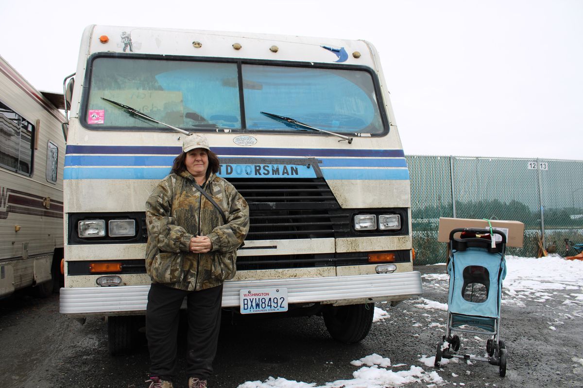 Ann Grant stands in front of her RV last Tuesday in Colville. She has lived in the homeless camp for the past couple of years. She said she is glad the city is finally shutting it down.  (Monica Carillo-Casas/The Spokesman-Review)