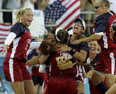 
The United States softball team allowed only one run en route to the Olympic gold medal. 
 (Associated Press / The Spokesman-Review)