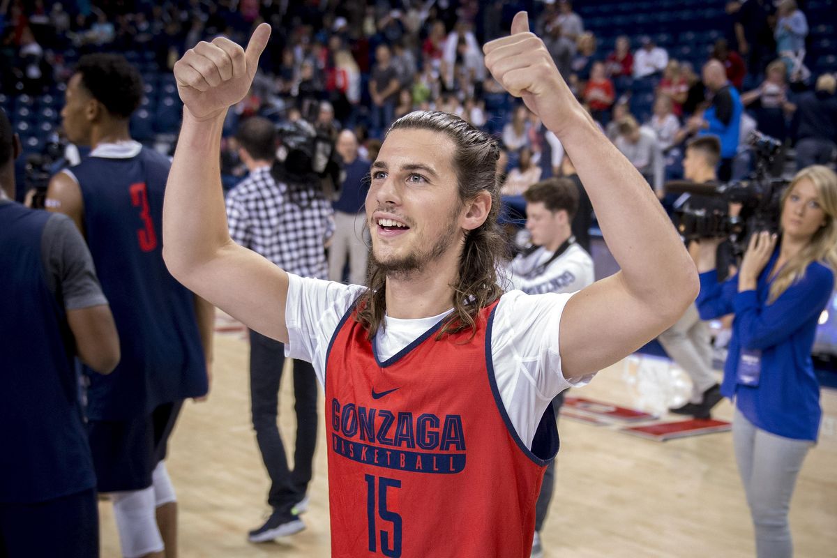 Gonzaga Bulldogs Red team guard Rem Bakamus (15) celebrates his red team beating the blue team 52-40 during the Kraziness in the Kennel scrimmage at Gonzaga University, Sat., Oct. 8, 2016, in Spokane, Wash. (Colin Mulvany / The Spokesman-Review)