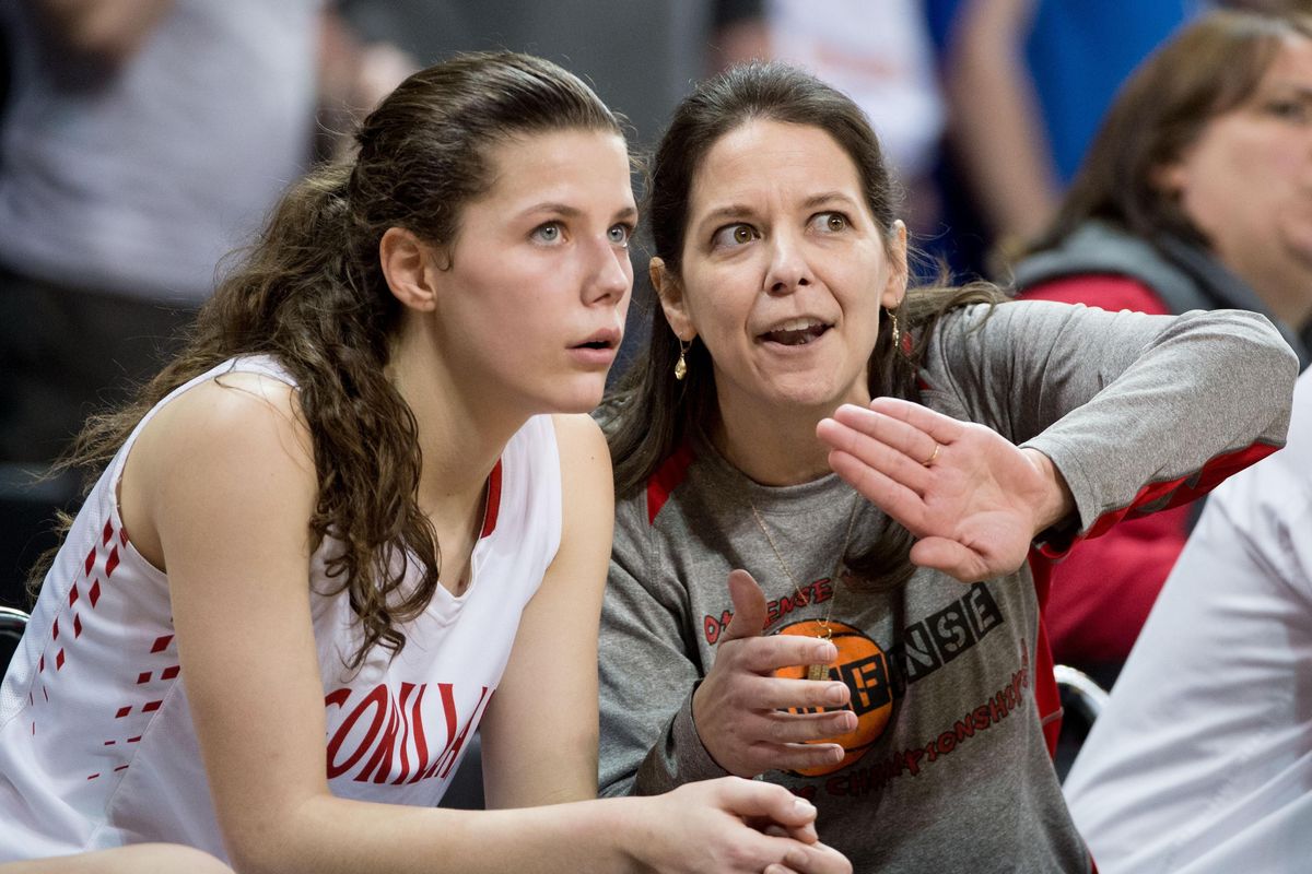 Davenport head coach Stacia Soliday gives pointers to daughter Darby Soliday during a WIAA State Girls 2B final basketball game on Saturday, March 3, 2018, at Spokane Arena. (Tyler Tjomsland / The Spokesman-Review)