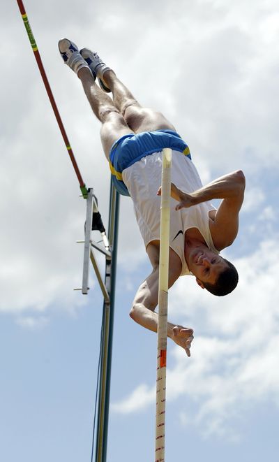 Brad Walker clears 19 feet-4.25 inches to take the lead in the pole vault competition at the Prefontaine Classic track and field invitational in Eugene, Oregon, on June 4, 2005.  (Tribune News Service)