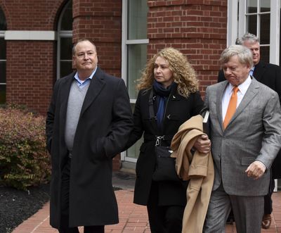 In this Feb. 9, 2016, file photo, former Pilot Flying J President Mark Hazelwood, left, leaves federal court after being arraigned in Knoxville, Tenn. (Michael Patrick / Associated Press)
