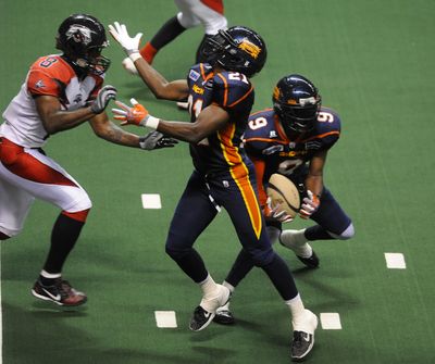 Shock defensive back Sergio Gilliam picks one of his three interceptions in Saturday night’s victory over Stockton at the Arena. (Colin Mulvany / The Spokesman-Review)