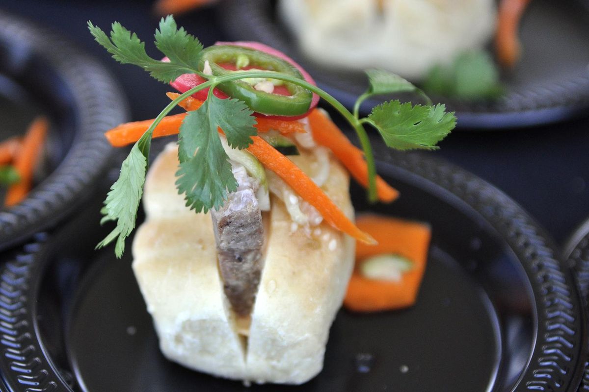 Tony Brown served this pork belly banh mi at the 2018 Crave Food and Drink Celebration in Spokane Valley in July. (Adriana Janovich / The Spokesman-Review)