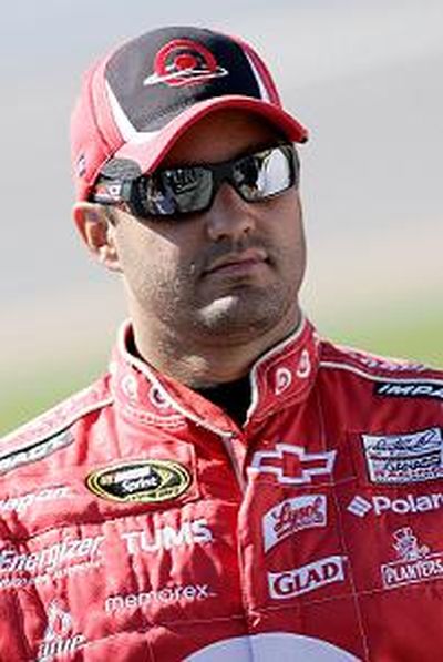 Juan Pablo Montoya relaxes on pit road. (Photo Credit: John Harrelson/Getty Images for NASCAR) (John Harrelson / The Spokesman-Review)
