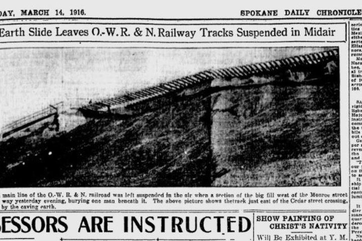 The Spokane Daily Chronicle printed a photo on  March 14, 1916, that showed the aftermath of massive slide of dirt above the Spokane River that left a section of railroad tracks suspended with nothing beneath it. (The Spokesman-Review / The Spokesman-Review)