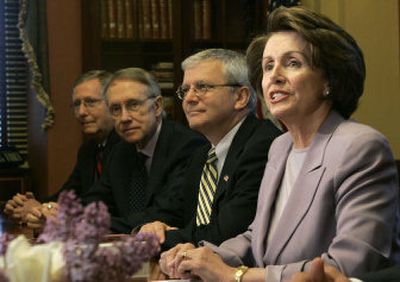 
House Speaker Nancy Pelosi of California addresses the media Friday  on Capitol Hill, joined by, from left, Sen.  Mitch McConnell, Sen. Harry Reid and White House chief of staff Josh Bolten. 
 (Associated Press / The Spokesman-Review)