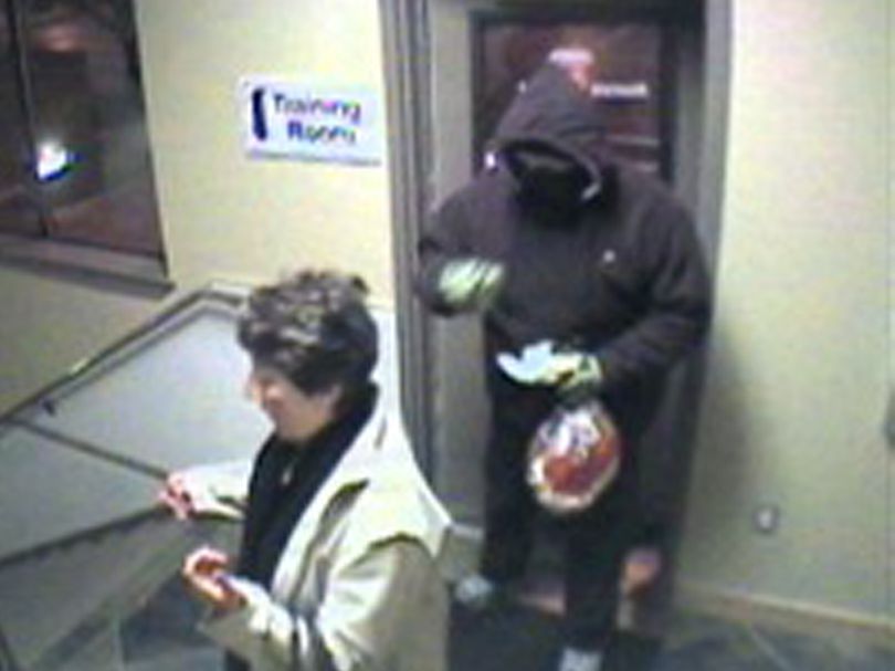 An unidentified person was caught on video in a robbery Tuesday morning December 22, 2009 at Mountain West Bank. Courtesy of Coeur d'Alene Police Department (Courtesy Police / The Spokesman-Review)