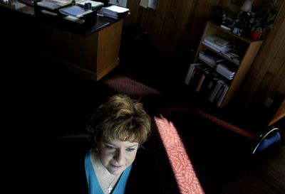 Jennifer Romero of Restored Paths sits in her Coeur d’Alene office. She is one of 200-plus small businesses getting help from the North Idaho College Small Business Development Center.   (Kathy Plonka / The Spokesman-Review)