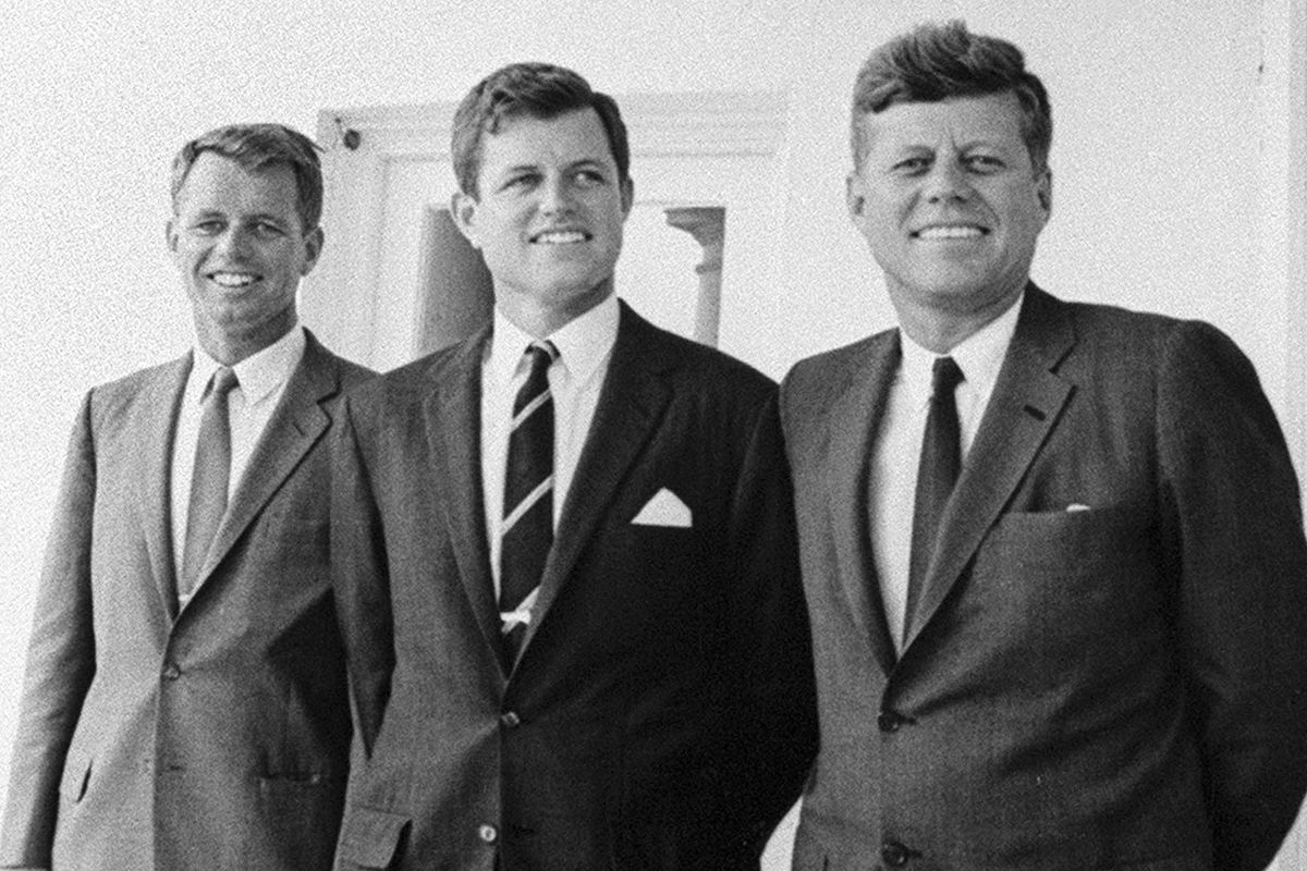 In this August 1963, photo, the Kennedy brothers, from left, Robert, Edward and U.S. President John F. Kennedy, pose together in Washington. The death on Wednesday, June 17, 2020, of Jean Kennedy Smith, the last surviving sibling of President Kennedy, means Camelot