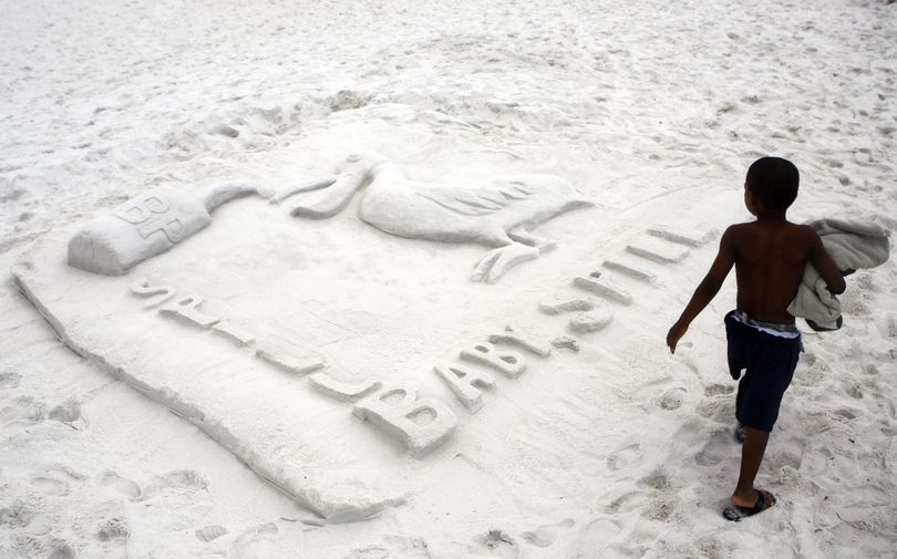 A  Sunday, June 6, 2010 photo shows the winning sand sculpture in the Fiesta of Five Flags sand sculpture contest at Pensacola Beach, Fla. , which displays a can of BP oil being poured over a pelican. Several oil spill themed sculptures were built by angry residents. (Alan Spearman / The Commercial Appeal)