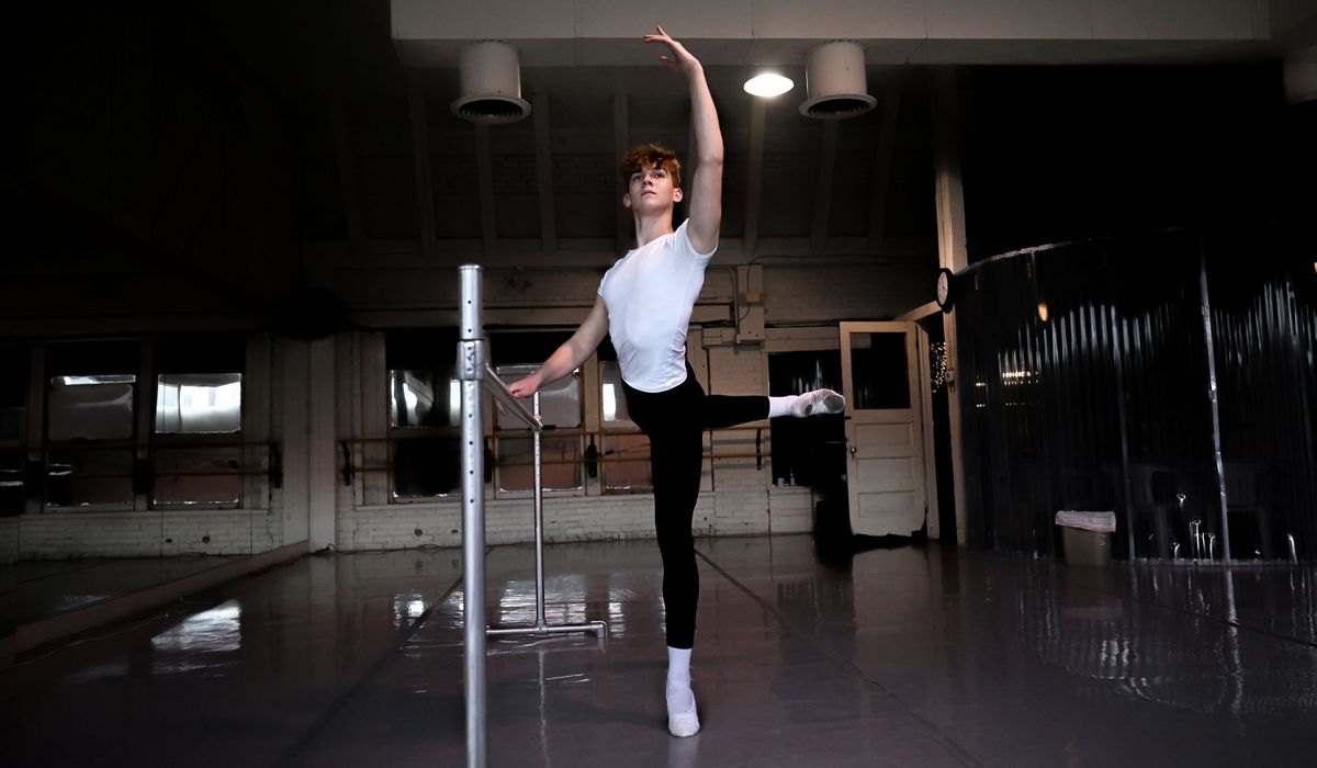 Ballet student Eli Waunch demonstrates a few ballet moves before class Wednesday at the Ballet Arts Academy in Spokane.  (Kathy Plonka/The Spokesman-Review)