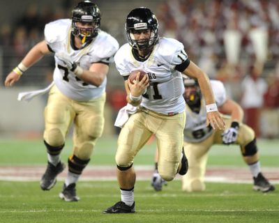 In this 2013 SR file photo, Idaho quarterback Chad Chalich (11) runs the ball against Washington State during the first half of a college football game at Martin Stadium in Pullman, Wash. Chalich, who transferred to Montana, will lead the Grizzlies this week. (Tyler Tjomsland / SR file photo)