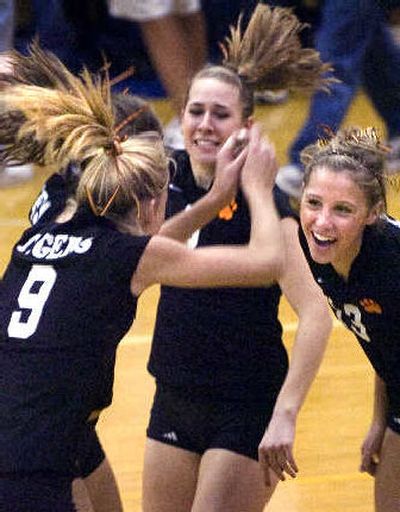 
Lewis and Clark's Chloe Rowand, right, cheers with Erica Ehlo (9). 
 (Holly Pickett / The Spokesman-Review)