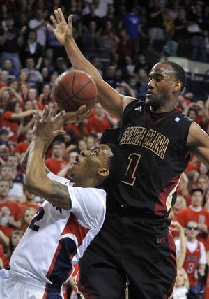 Gonzaga's Marquise Carter works inside on Santa Clara's Troy Payne in the first half on Feb. 17, 2011. (Dan Pelle / The Spokesman-Review)