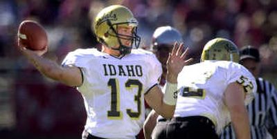 Then: John Welsh's four-year career at Idaho started with the Humanitarian Bowl team in 1998. 
 (File / The Spokesman-Review)