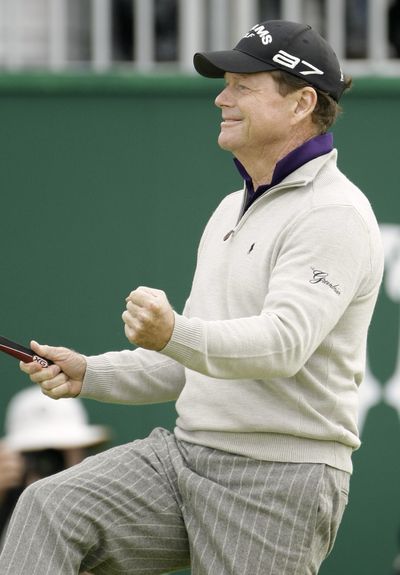Tom Watson celebrates birdie on No. 18 that gave him a share of lead.  (Associated Press / The Spokesman-Review)