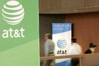 The new AT&T Corp. logo is displayed at company offices in Bedminster, N.J., on Monday. 
 (Associated Press / The Spokesman-Review)